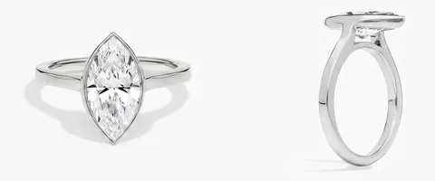 A bezel engagement ring, face up and in profile