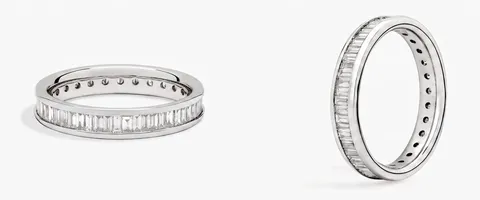 A channel-set engagement ring, face up and in profile
