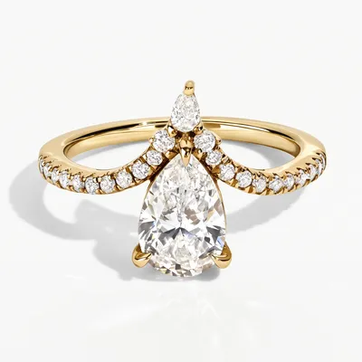A pear shaped diamond in an engagement ring