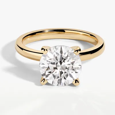 A round brilliant diamond in an engagement ring